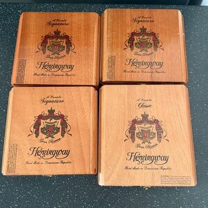 Set of 4 Hemingway wooden cigar boxes $70